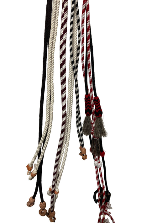 Set of decorative horse reins on a white background